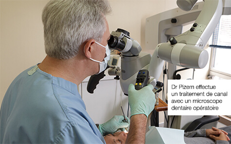 Dr Pizem effectue un Traitement de Canal Micro Endodontique